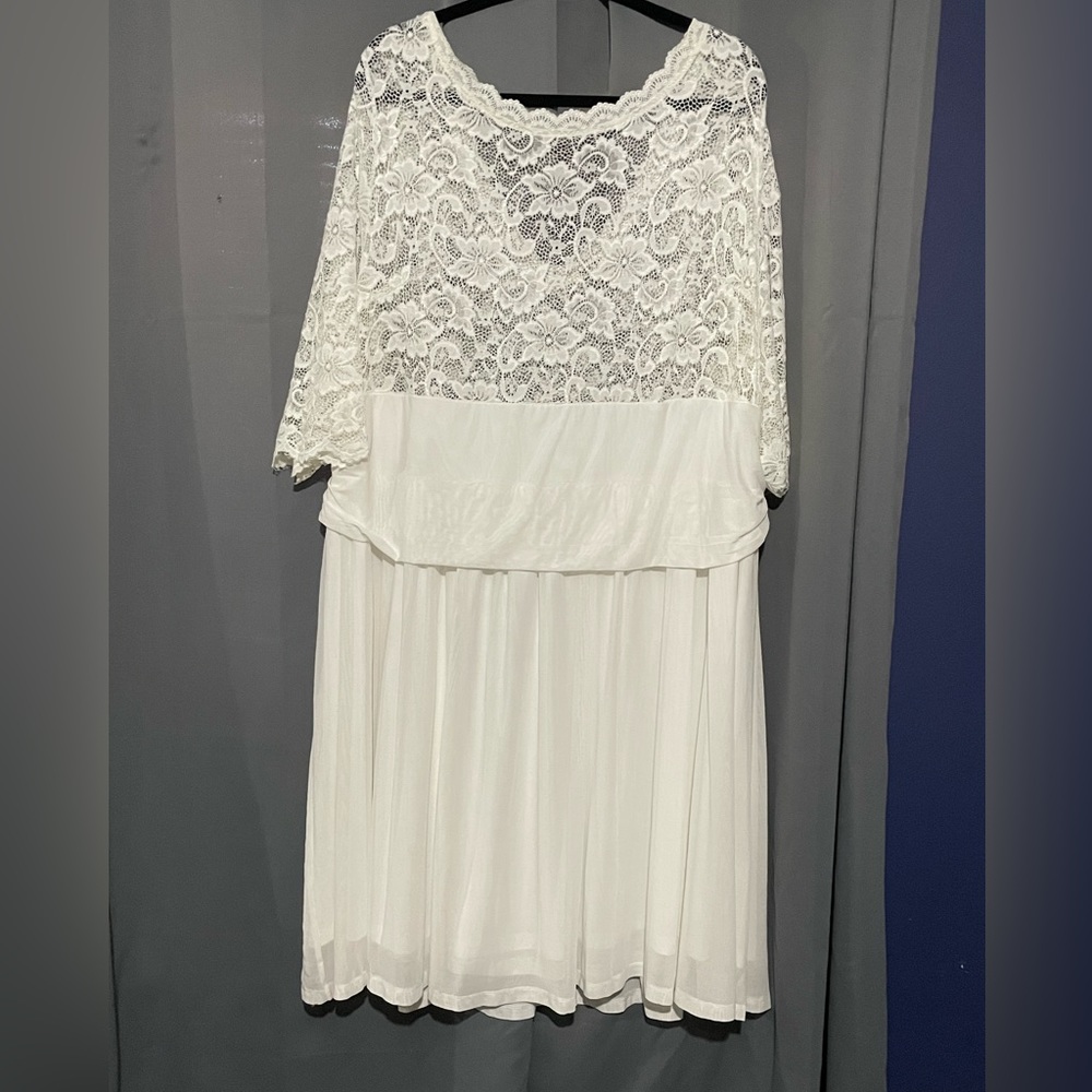 Beautiful, elegant white lace wedding dress.